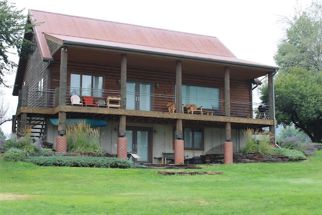 26 N Cooper Ln, Cascade, MT 59421 - back of house featuring a lawn, metal roof, and french doors