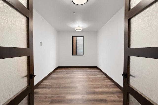 311 Akers Ln Unit D, Whitefish, MT 59937 - unfurnished room with wood finished floors and baseboards