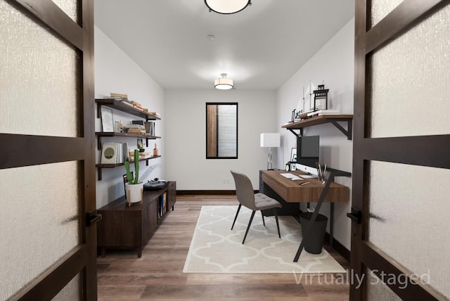 311 Akers Ln Unit D, Whitefish, MT 59937 - office space featuring wood finished floors and baseboards