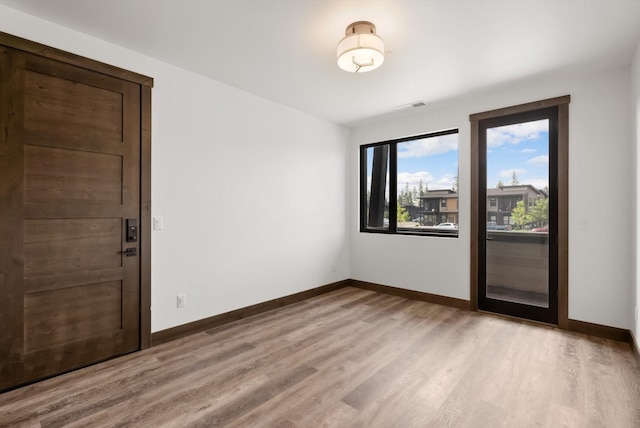311 Akers Ln Unit D, Whitefish, MT 59937 - empty room featuring light wood-style flooring and baseboards