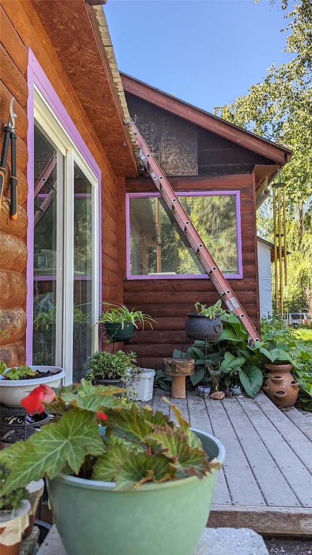 exterior space featuring a wooden deck