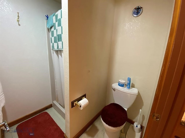 bathroom featuring toilet