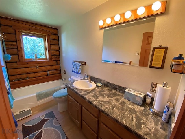 full bathroom with toilet, vanity, and bathtub / shower combination