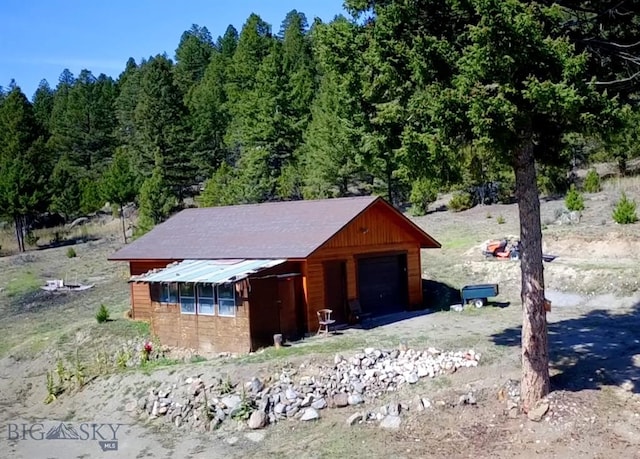 view of outdoor structure featuring a garage