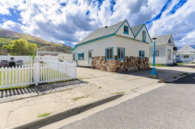 view of front of house with a mountain view