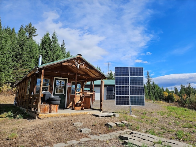 exterior space featuring solar panels