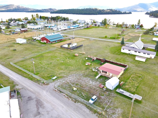 bird's eye view featuring a water and mountain view