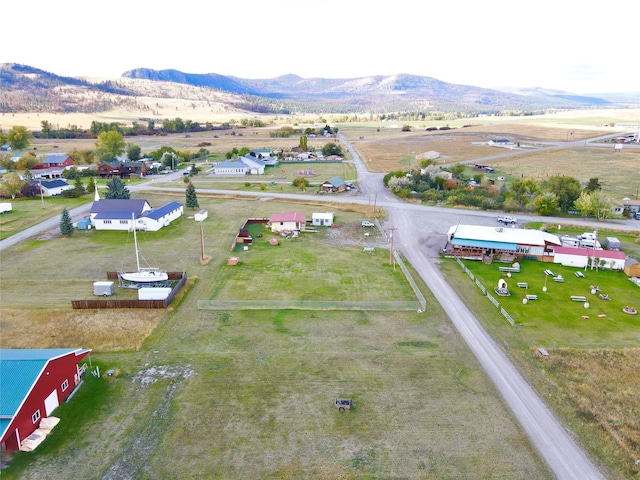 aerial view featuring a mountain view and a rural view