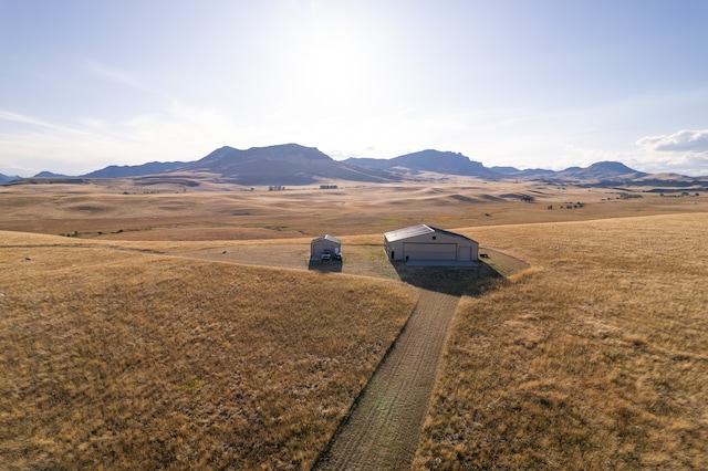 view of mountain feature with a rural view