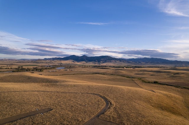 mountain view featuring a rural view