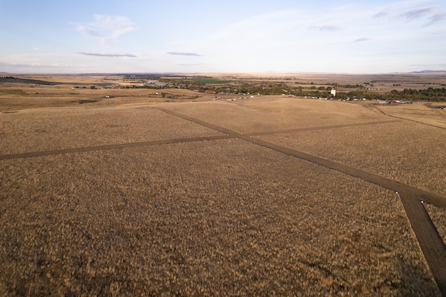 birds eye view of property featuring a rural view