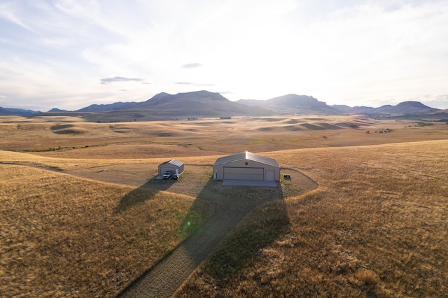 mountain view featuring a rural view