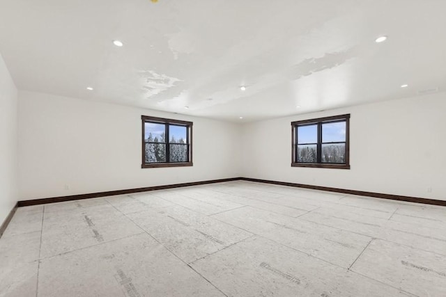 unfurnished room with plenty of natural light