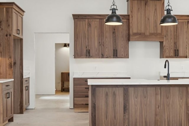 kitchen with hanging light fixtures and sink