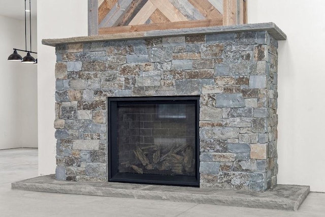 room details featuring a stone fireplace