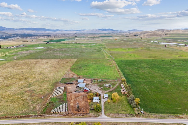 bird's eye view with a mountain view and a rural view