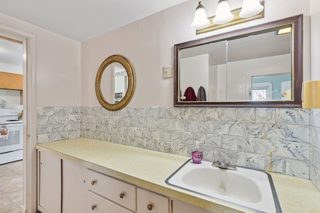 bathroom featuring backsplash, tile floors, tile walls, and vanity