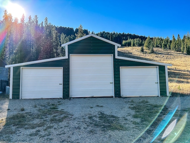 425 Lagger Gulch Rd, Anaconda, MT 59711 - detached garage featuring a forest view