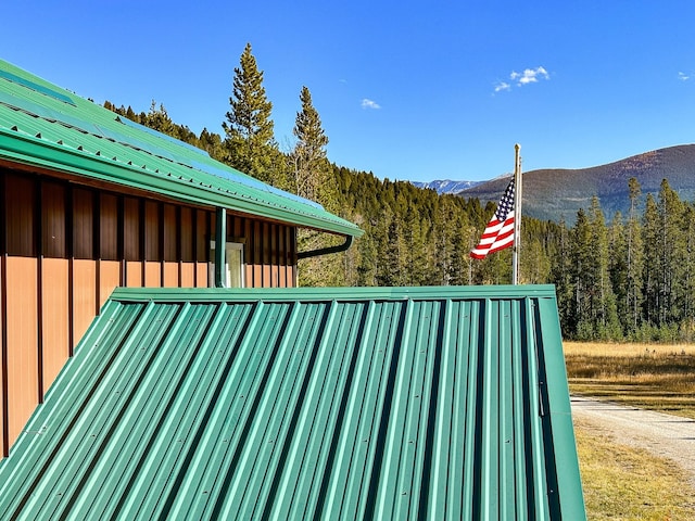 425 Lagger Gulch Rd, Anaconda, MT 59711 - exterior space featuring a mountain view, a view of trees, and board and batten siding