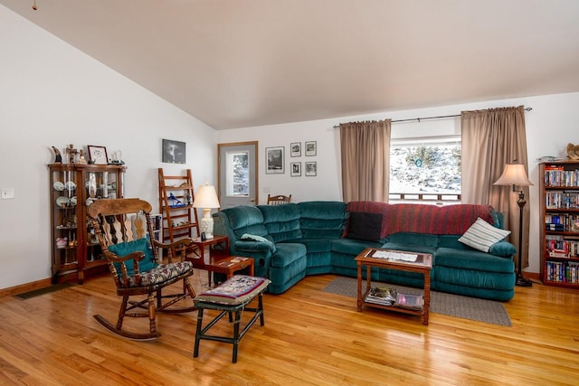 425 Lagger Gulch Rd, Anaconda, MT 59711 - living area featuring vaulted ceiling and wood finished floors