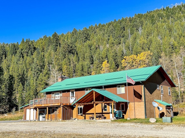 425 Lagger Gulch Rd, Anaconda, MT 59711 - view of horse barn with a forest view