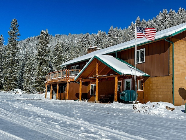 425 Lagger Gulch Rd, Anaconda, MT 59711 - view of front facade featuring a chimney and a deck