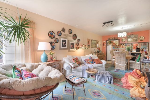 living room featuring an inviting chandelier