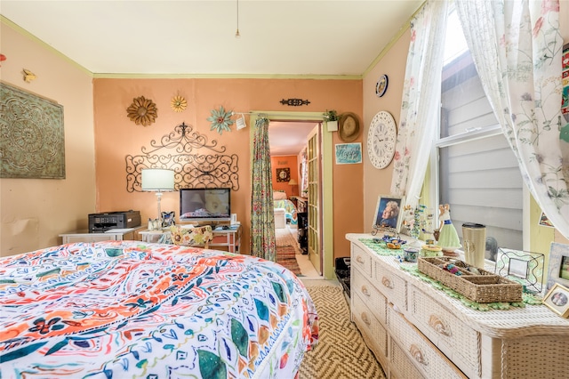 bedroom with ornamental molding