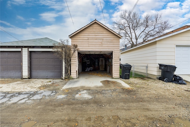 garage featuring fence