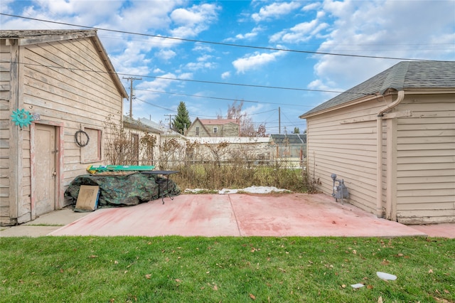 view of patio featuring fence