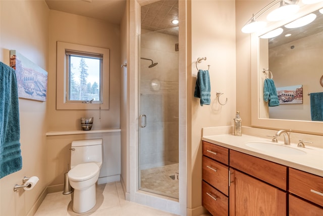 bathroom featuring walk in shower, tile patterned floors, vanity, and toilet