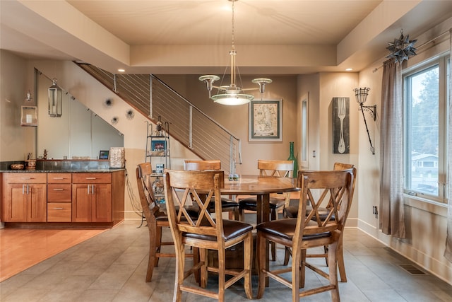 view of tiled dining space