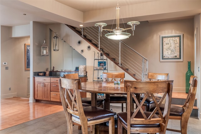 dining area with hardwood / wood-style flooring