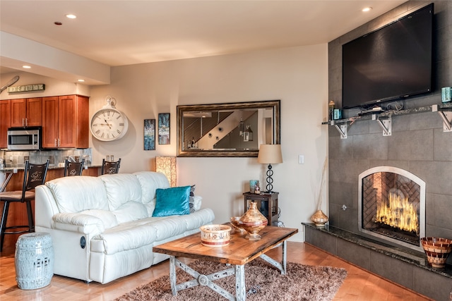 living room with light hardwood / wood-style flooring