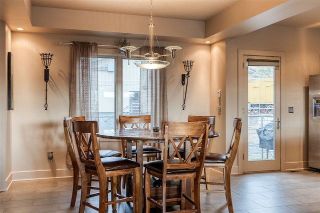 dining area featuring plenty of natural light