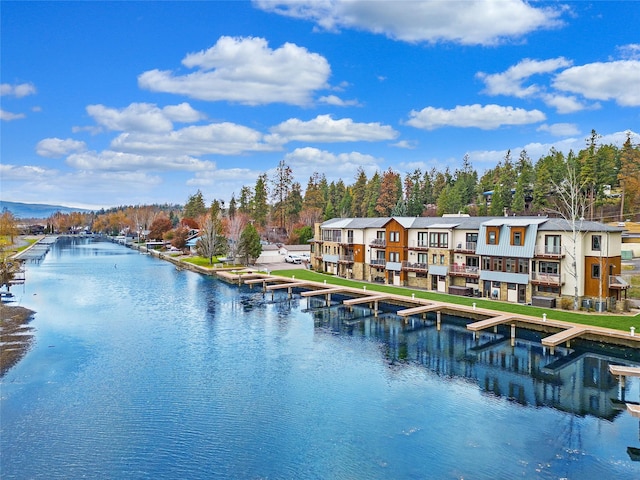 property view of water featuring a boat dock