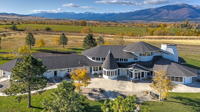 bird's eye view featuring a rural view and a mountain view