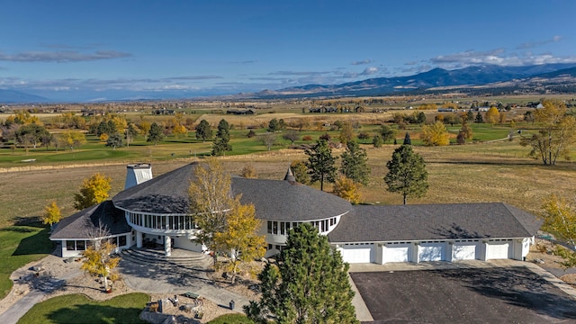 aerial view featuring a mountain view and a rural view