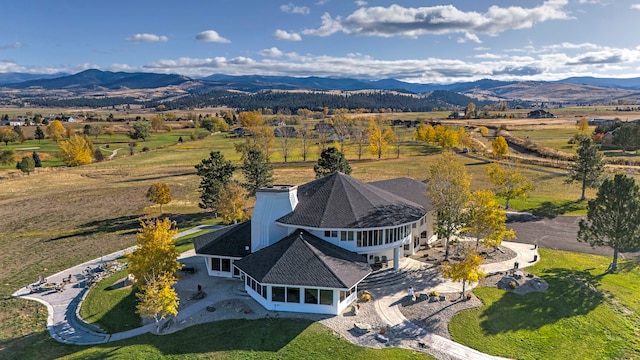 bird's eye view with a rural view and a mountain view