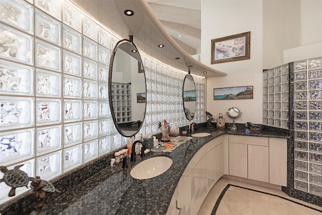 bathroom featuring vanity and tile patterned flooring