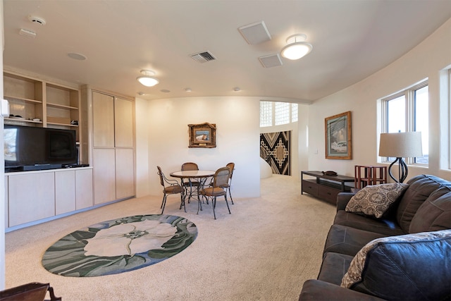 living room with light carpet