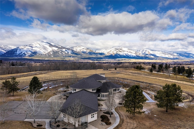 birds eye view of property featuring a rural view and a mountain view