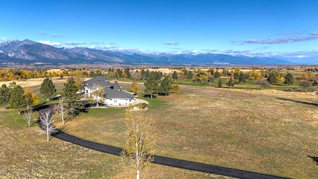 aerial view with a mountain view and a rural view