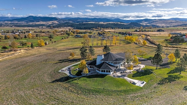 aerial view featuring a mountain view and a rural view