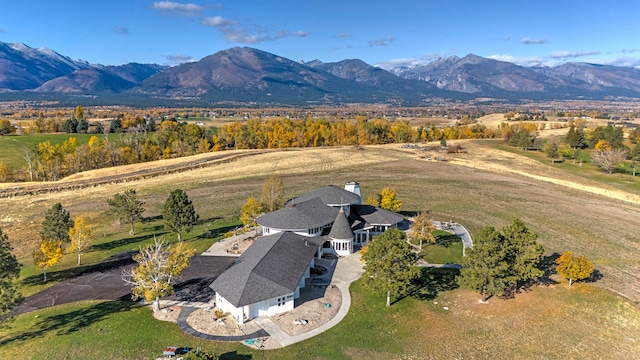 drone / aerial view featuring a mountain view