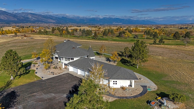 aerial view featuring a mountain view and a rural view