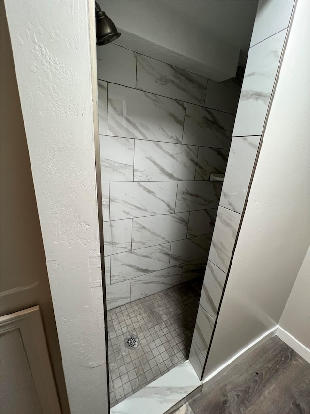 715 Texas Ave, Deer Lodge, MT 59722 - full bathroom with a stall shower and wood finished floors