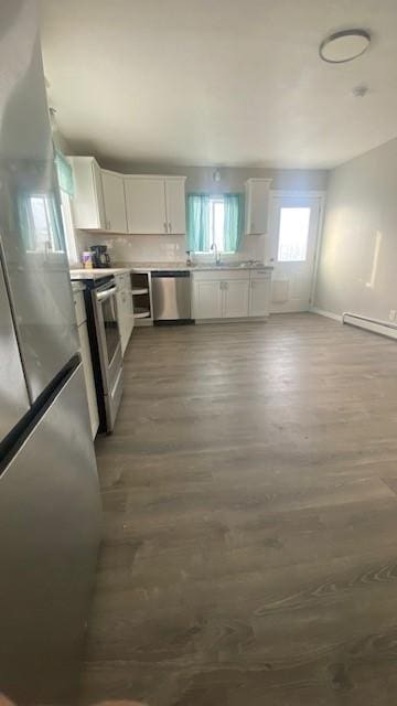 715 Texas Ave, Deer Lodge, MT 59722 - kitchen featuring stainless steel appliances, white cabinetry, and dark wood-type flooring
