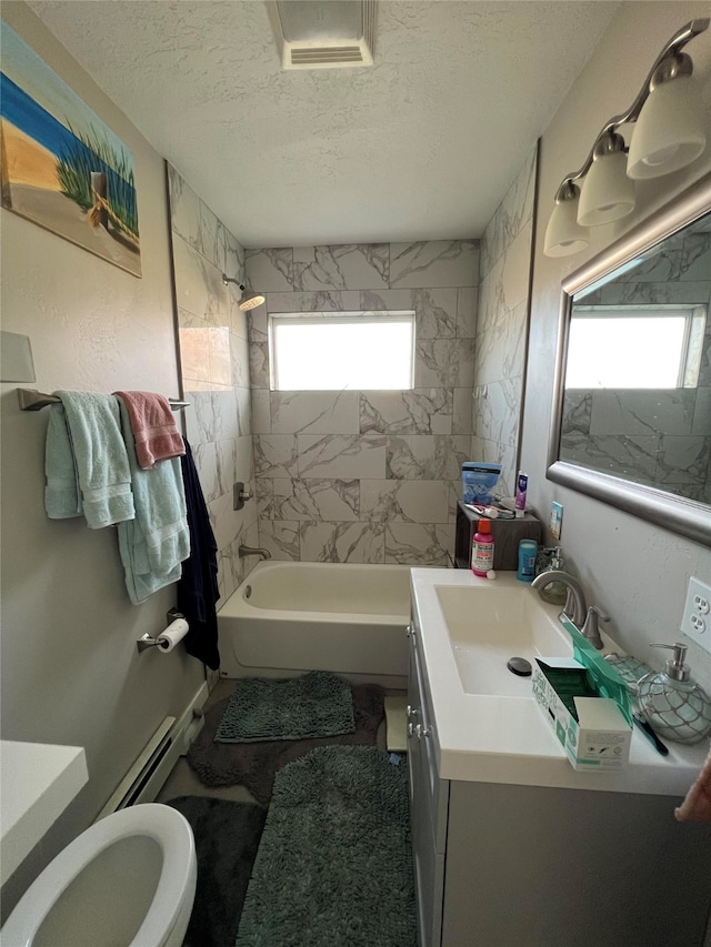 715 Texas Ave, Deer Lodge, MT 59722 - bathroom with vanity, a textured ceiling,  shower combination, and a baseboard heating unit