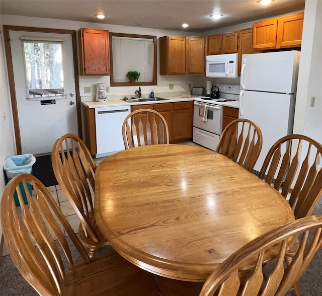 kitchen with white appliances and sink